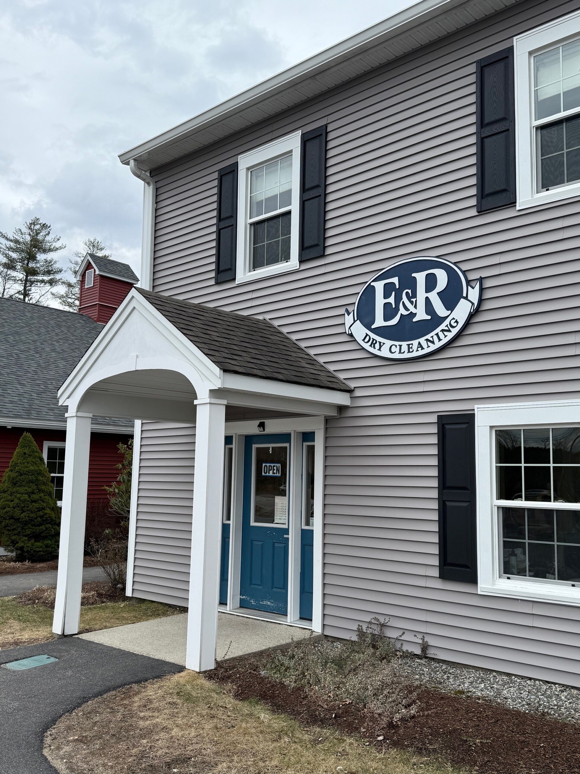 Exterior view of E&R Cleaners in Bedford.
